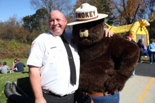 Chief Sheldon with Smokey the Bear